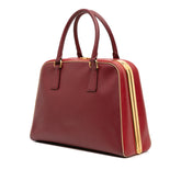 Saffiano Lux Pyramid Frame Top Handle Bag